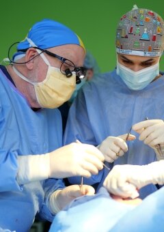 Dr. John Froder teaches two Ukrainian residents.